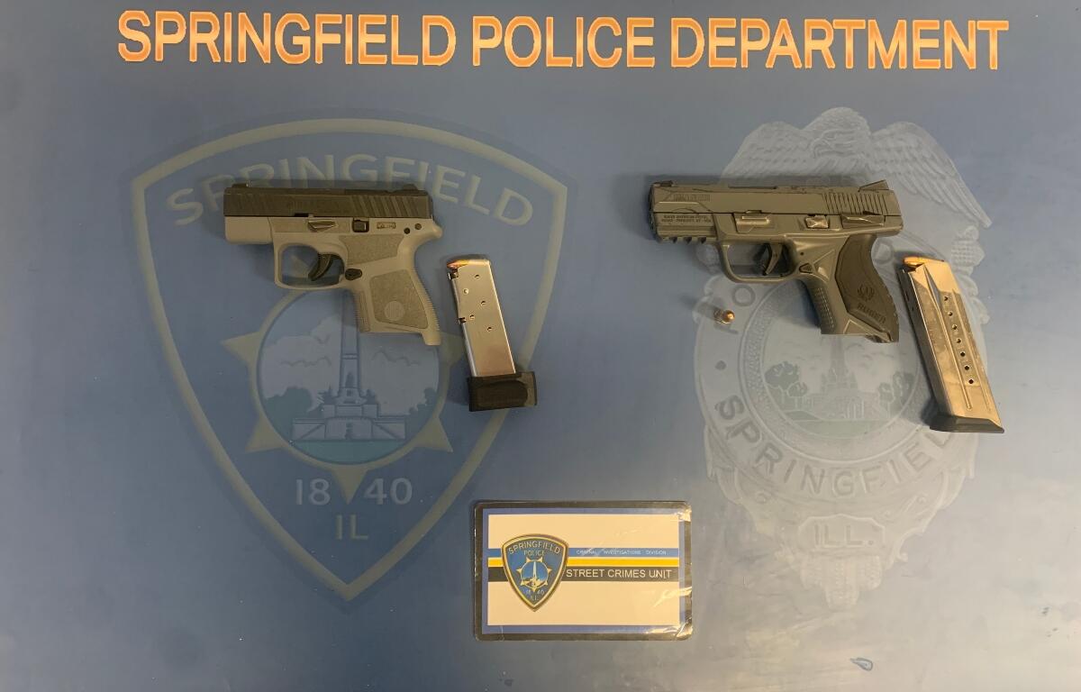 Springfield Police say these two guns were found Monday night in a vehicle.