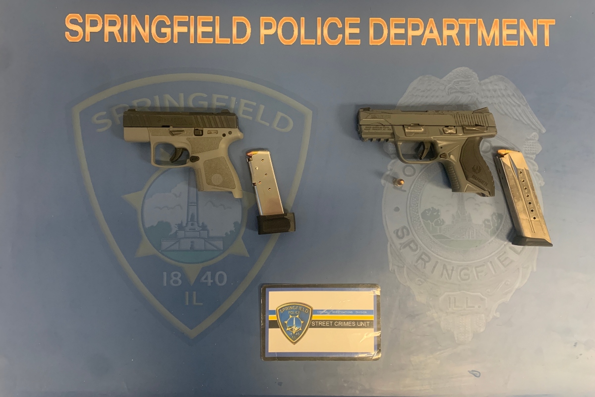 Springfield Police say these two guns were found Monday night in a vehicle.