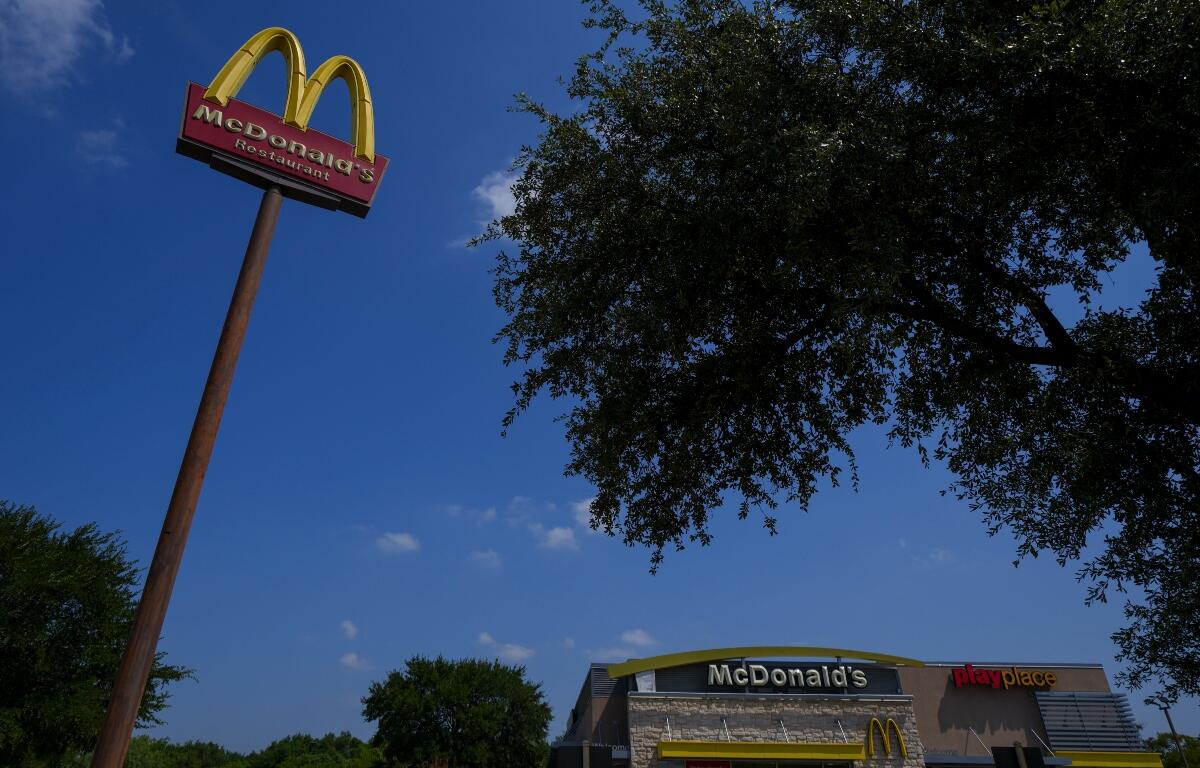 A McDonald's restaurant is visible Tuesday, Aug. 5, 2025, in Arlington, Texas. (AP Photo/Julio Cortez)