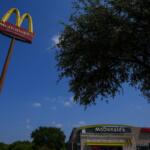 A McDonald's restaurant is visible Tuesday, Aug. 5, 2025, in Arlington, Texas. (AP Photo/Julio Cortez)