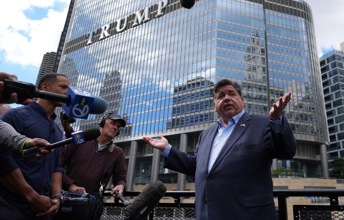 Illinois Governor JB Pritzker speaks at a news conference in a Chicago water taxi Monday, Aug. 25, 2025, in Chicago. (AP Photo/Nam Y. Huh)