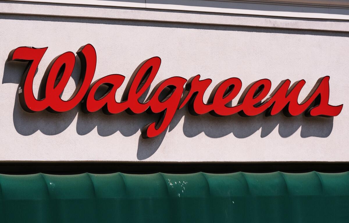 FILE - The Walgreens logo on a pharmacy and retail store, Aug. 13, 2025, in Newton, Mass. (AP Photo/Charles Krupa, File)