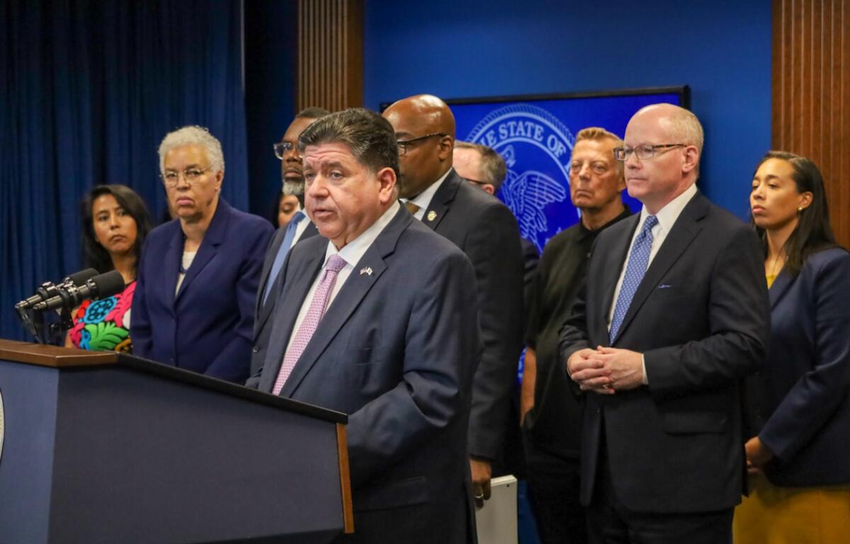 Gov. JB Pritzker speaks alongside elected officials, religious leaders and immigration advocates at a news conference on Sept. 29, 2025. (Capitol News Illinois photo by Andrew Adams)