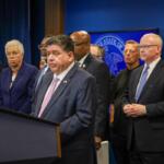 Gov. JB Pritzker speaks alongside elected officials, religious leaders and immigration advocates at a news conference on Sept. 29, 2025. (Capitol News Illinois photo by Andrew Adams)