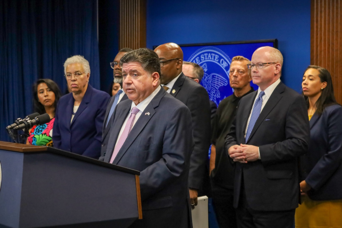 Gov. JB Pritzker speaks alongside elected officials, religious leaders and immigration advocates at a news conference on Sept. 29, 2025. (Capitol News Illinois photo by Andrew Adams)