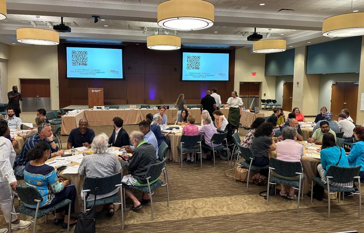 Following presentations from each of four sub-committees of the Massey Commission, members met in small groups with attendees to further discuss the recommendations.