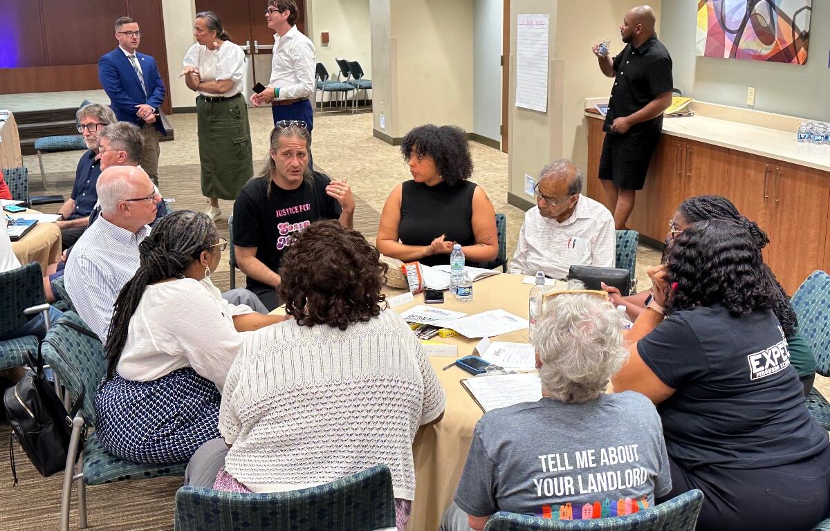 Members of the public and members of the Massey Commission discussed some of the commission's recommendations Monday night in small groups.