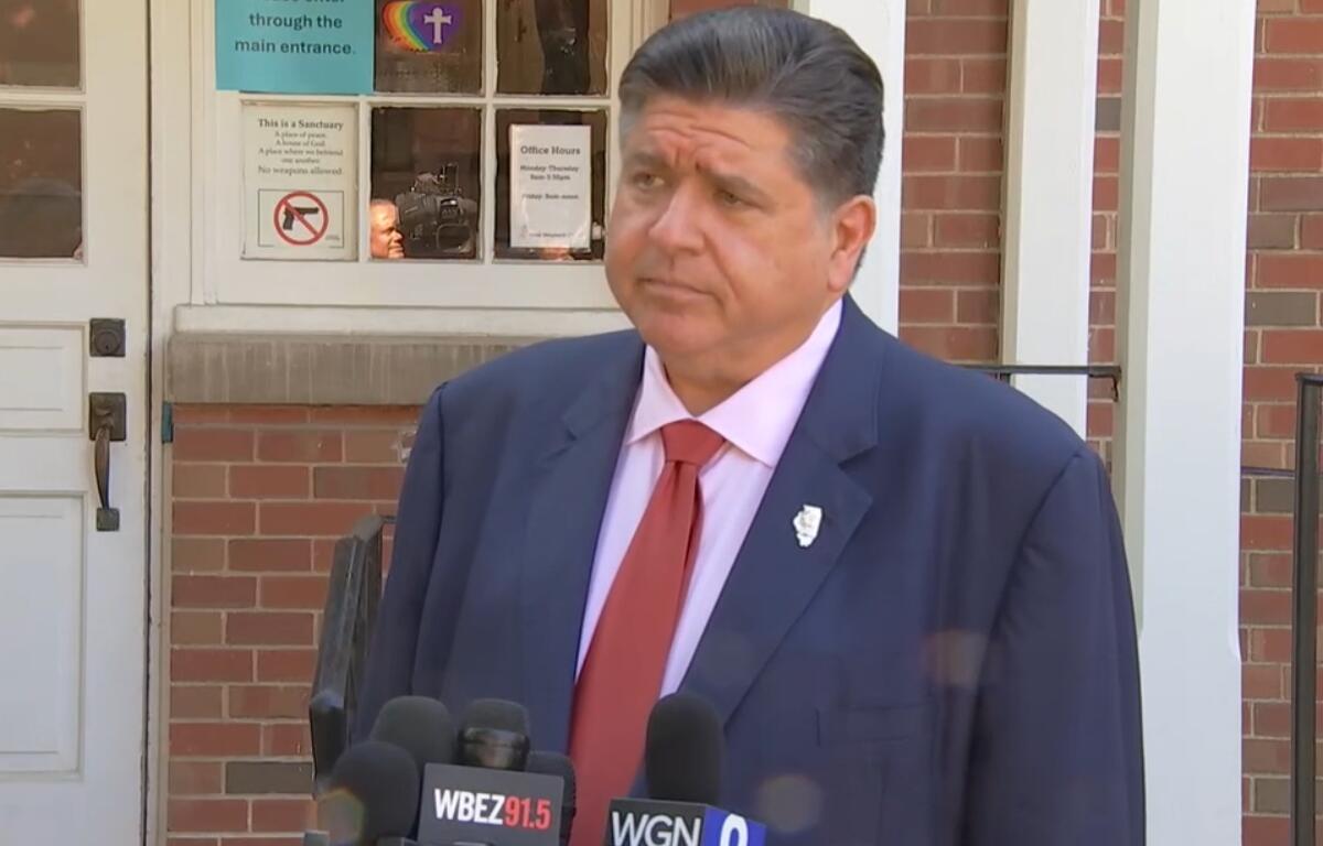 Governor JB Pritzker spoke to reporters Tuesday in the Chicago suburb of Oak Park.
