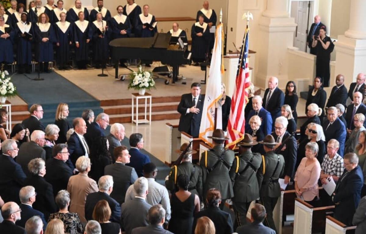 The Illinois State Police Honor Guard takes part in the funeral for Former Gov. Jim Edgar.