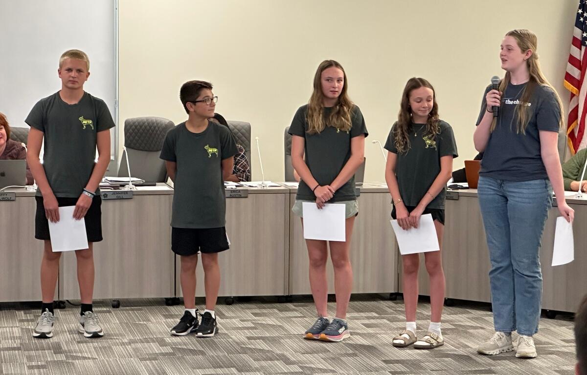 Students at Lincoln Magnet School in Springfield talk at a recent school board meeting about their Governor's Hometown Award.