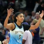 Chicago Sky forward Angel Reese walks to the bench during the second half of a WNBA basketball game against the Phoenix Mercury Thursday, Aug. 28, 2025, in Phoenix. (AP Photo/Ross D. Franklin)
