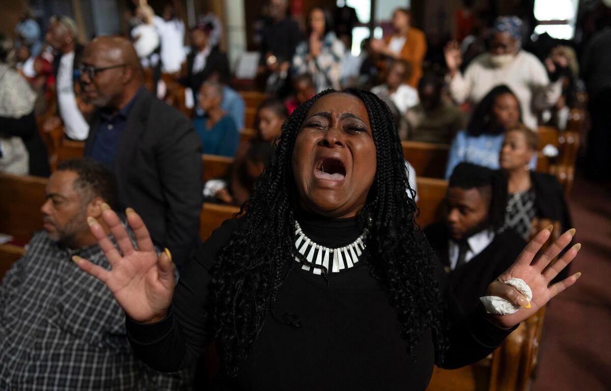 Darleen Hall worships during a service at New Mount Pilgrim Missionary Baptist Church, Sunday, Sept. 7, 2025, in Chicago. (AP Photo/Carolyn Kaster)