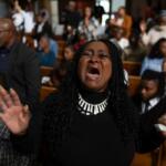 Darleen Hall worships during a service at New Mount Pilgrim Missionary Baptist Church, Sunday, Sept. 7, 2025, in Chicago. (AP Photo/Carolyn Kaster)