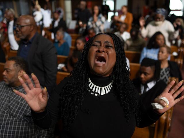 Darleen Hall worships during a service at New Mount Pilgrim Missionary Baptist Church, Sunday, Sept. 7, 2025, in Chicago. (AP Photo/Carolyn Kaster)