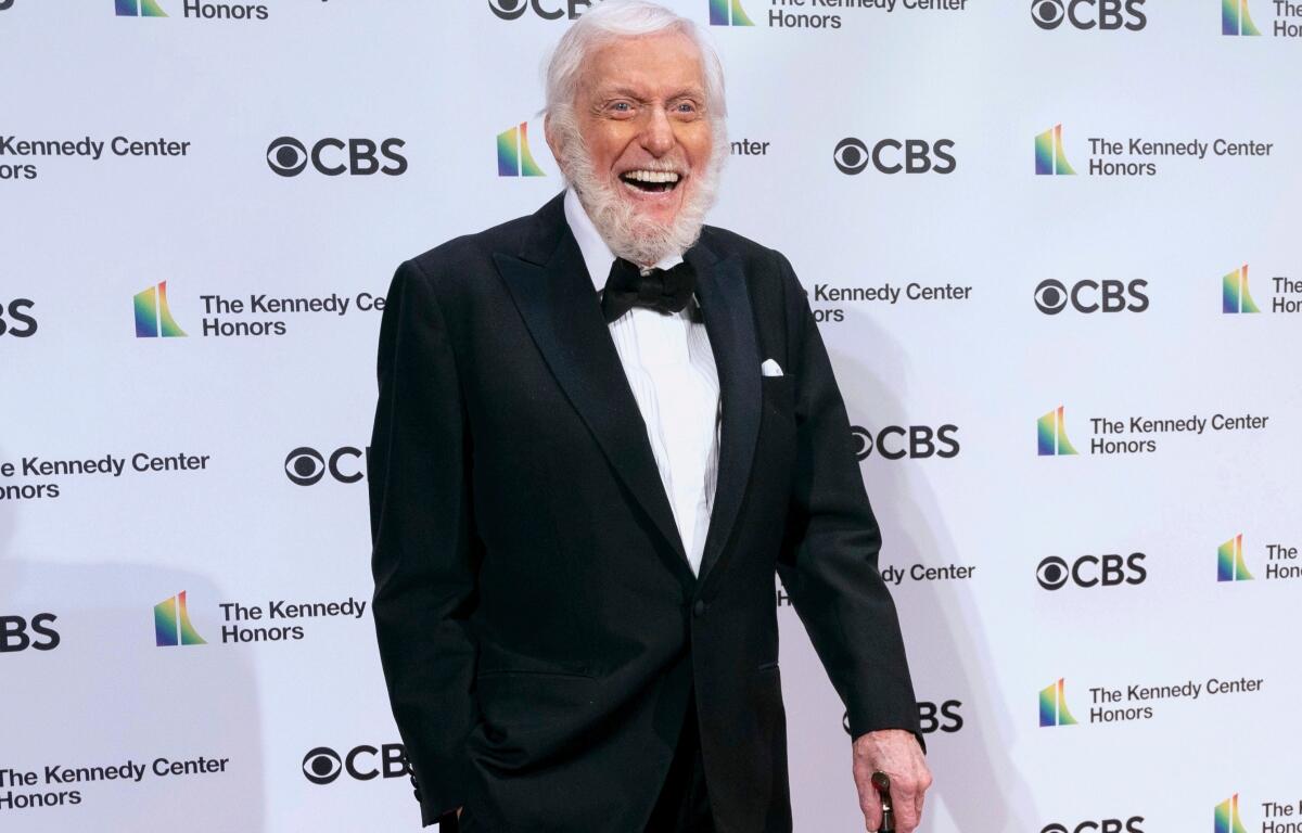 FILE - Honoree Dick Van Dyke attends the 43nd Annual Kennedy Center Honors at The Kennedy Center on May 21, 2021, in Washington. (AP Photo/Kevin Wolf, File)