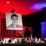 A photo of Charlie Kirk, the CEO and co-founder of Turning Point USA who was shot and killed, stands at his vigil, Thursday, Sept. 11, 2025, in Orem, Utah. (AP Photo/Lindsey Wasson)