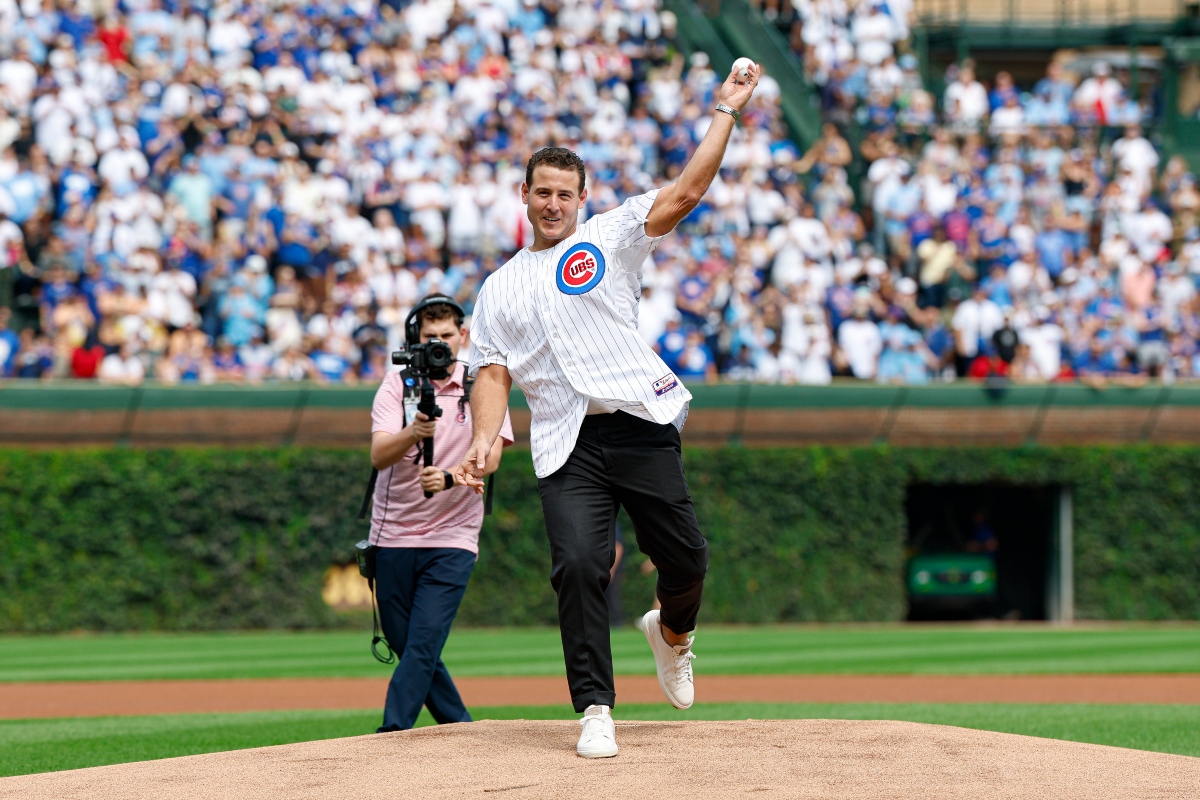 Former Chicago Cubs player Anthony Rizzo throws out a ceremonial first pitch before a baseball game between the Tampa Bay Rays and Chicago Cubs, Saturday, Sept. 13, 2025, in Chicago. (AP Photo/Kamil Krzaczynski)