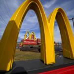 FILE - McDonald's restaurant signs are shown in in East Palestine, Ohio, Feb. 9, 2023. (AP Photo/Gene J. Puskar, File)