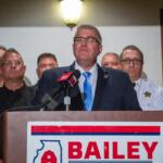 State Sen. Darren Bailey appears at a news conference alongside law enforcement officers during his 2022 campaign for governor. (Capitol News Illinois photo by Jerry Nowicki)