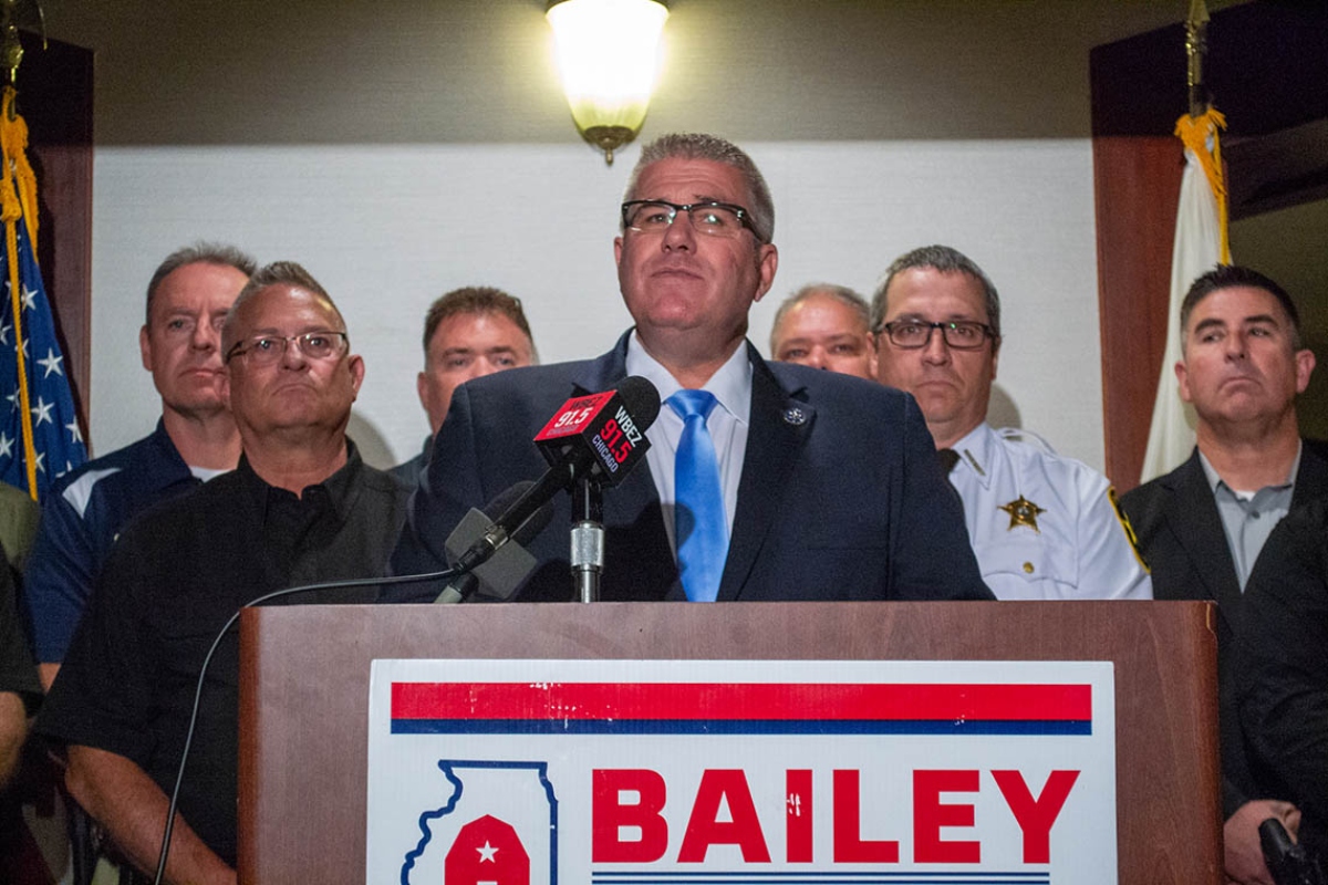 State Sen. Darren Bailey appears at a news conference alongside law enforcement officers during his 2022 campaign for governor. (Capitol News Illinois photo by Jerry Nowicki)