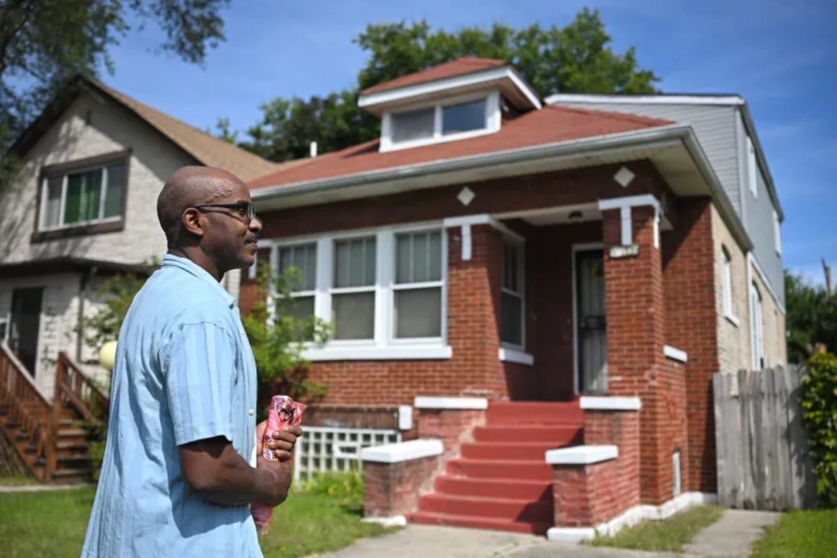 Frank Moore felt the sting of the state's tax sale laws when he lost his home after a mix-up over unpaid property taxes. He now has it back after cutting a deal with the company who bought his taxes. (Credit: Victor Hilitski/For Illinois Answers Project)