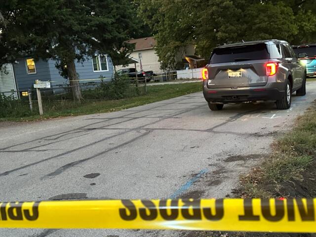 Three people were killed Thursday at the house, seen left, in the 3000 block of Hoover Ave.