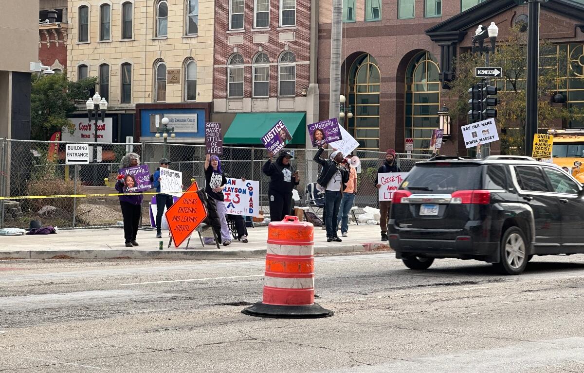 A small group of rally-goers were outside the Peoria County Courthouse Friday afternoon.