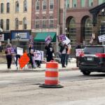 A small group of rally-goers were outside the Peoria County Courthouse Friday afternoon.