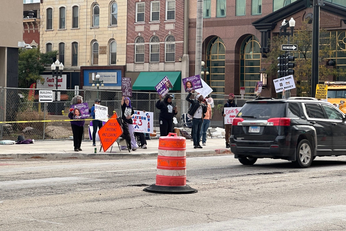 A small group of rally-goers were outside the Peoria County Courthouse Friday afternoon.