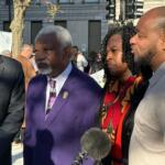 Left to right: Anthony Romanucci, James Wilburn, Teresa Haley, and Sontae Massey, all speaking with a reporter Wednesday afternoon in downtown Peoria.