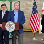 L to R: Gov. JB Pritzker, Chris Richmond, State Sen. Doris Turner.