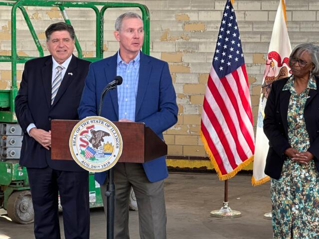 L to R: Gov. JB Pritzker, Chris Richmond, State Sen. Doris Turner.