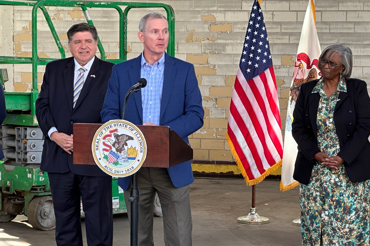 L to R: Gov. JB Pritzker, Chris Richmond, State Sen. Doris Turner.