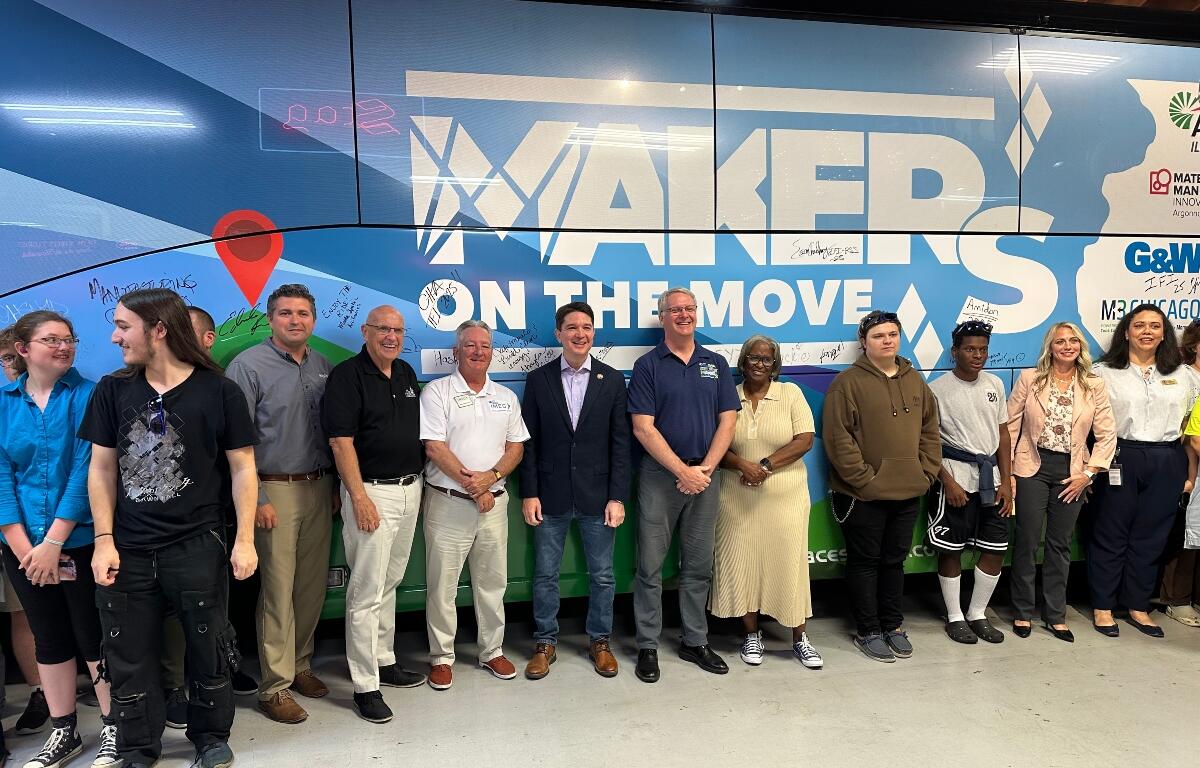 The bus used in the "Makers on the Move" bus tour is displayed at Ace Sign Company Monday.