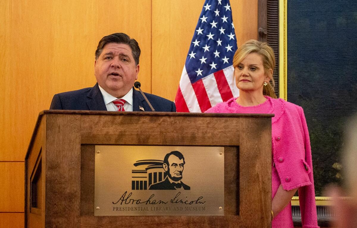 Gov. JB Pritzker and wife MK are pictured at an event at the Abraham Lincoln Presidential Library in Springfield in April 2024. (Capitol News Illinois photo by Jerry Nowicki)
