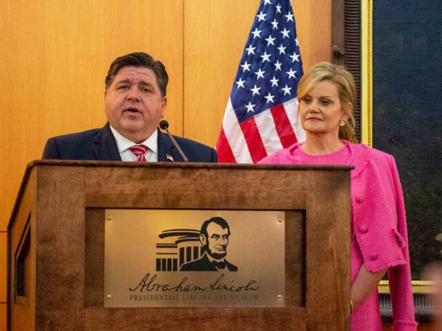 Gov. JB Pritzker and wife MK are pictured at an event at the Abraham Lincoln Presidential Library in Springfield in April 2024. (Capitol News Illinois photo by Jerry Nowicki)