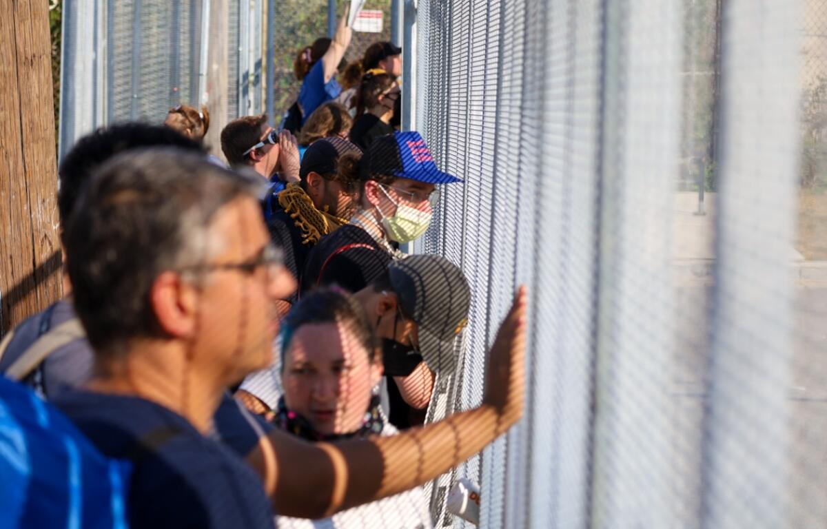 Protesters and reporters gathered outside an immigration enforcement facility in Broadview, Illinois, on Saturday, Oct. 4. (Capitol News Illinois photo by Andrew Adams)