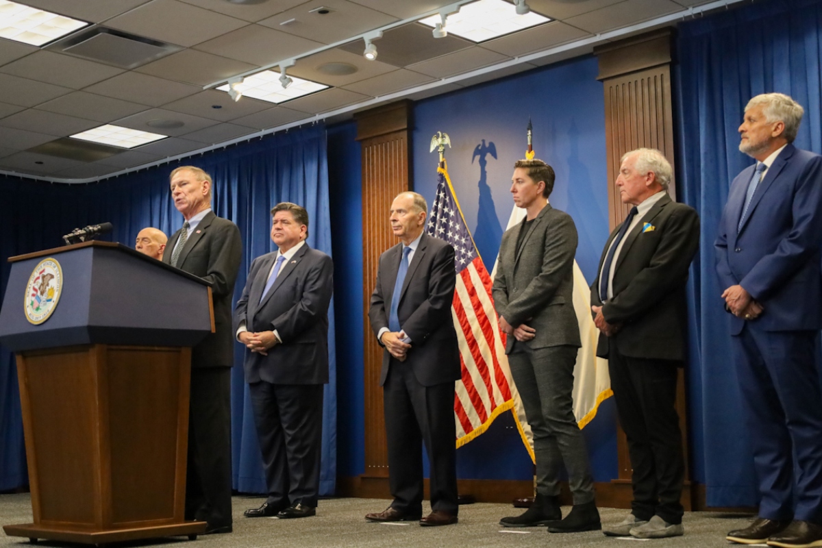 Ret. Maj. Gen. Randy Manner condemns the use of military troops to support domestic law enforcement at an Oct. 16 news conference alongside Gov. JB Pritzker and other retired military officers. Also pictured, from left to right: Lt. Gen. Charles Luckey, Gov. JB Pritzker, Maj. Gen. William Enyart, Capt. Janessa Goldbeck, Maj. Gen. Paul Eaton and Rear Adm. Michael Smith. (Capitol News Illinois photo by Andrew Adams)