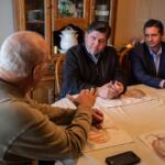 Christian County farmer Ben Curtin (left), his wife Linda and daughter Lori Parks hosted Gov. JB Pritzker (center) and Illinois Agriculture Director Jerry Costello II at their family farm in Taylorville on Wednesday, Oct. 29, 2025. The group discussed the impact of tariffs and the Trump administration’s purchases of Argentinian beef on Illinois farmers. (Capitol News Illinois photo by Jerry Nowicki)
