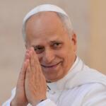 Pope Leo XIV gestures as he arrives for his weekly general audience in St. Peter's Square at The Vatican, Wednesday, Oct.1, 2025. (AP Photo/Gregorio Borgia)