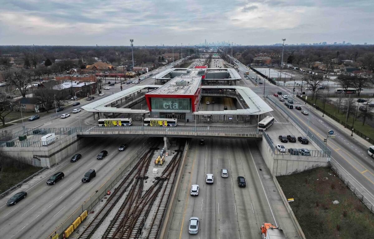 FILE - Cars pass the 95th Street Red Line Station, the train station currently the farthest south on the line and where the Chicago Transit Authority plans to extend from in 2025, Thursday, Dec. 19, 2024, in Chicago. (AP Photo/Erin Hooley, File)