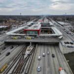 FILE - Cars pass the 95th Street Red Line Station, the train station currently the farthest south on the line and where the Chicago Transit Authority plans to extend from in 2025, Thursday, Dec. 19, 2024, in Chicago. (AP Photo/Erin Hooley, File)