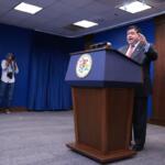 Governor JB Pritzker, second from right, speaks as Chicago Mayor Brandon Johnson, right, listens to him at a news conference in Chicago, Monday, Oct. 6, 2025. (AP Photo/Nam Y. Huh)