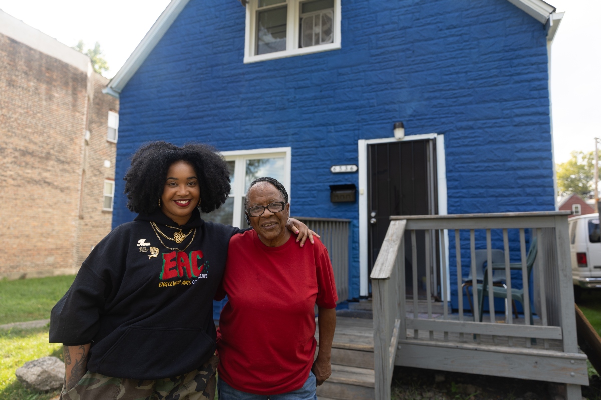 Artist Tonika Lewis Johnson and local resident Justine Stephens, right, stand for portrait in the 6500-block of South Aberdeen Street in Chicago's Englewood neighborhood, on Monday, Oct. 6, 2025. (AP Photo/Talia Sprague)