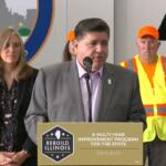 Gov. JB Pritzker announces the state’s six-year, $50.6 billion infrastructure plan at a news conference Wednesday in Chicago. (Illinois.gov screenshot)