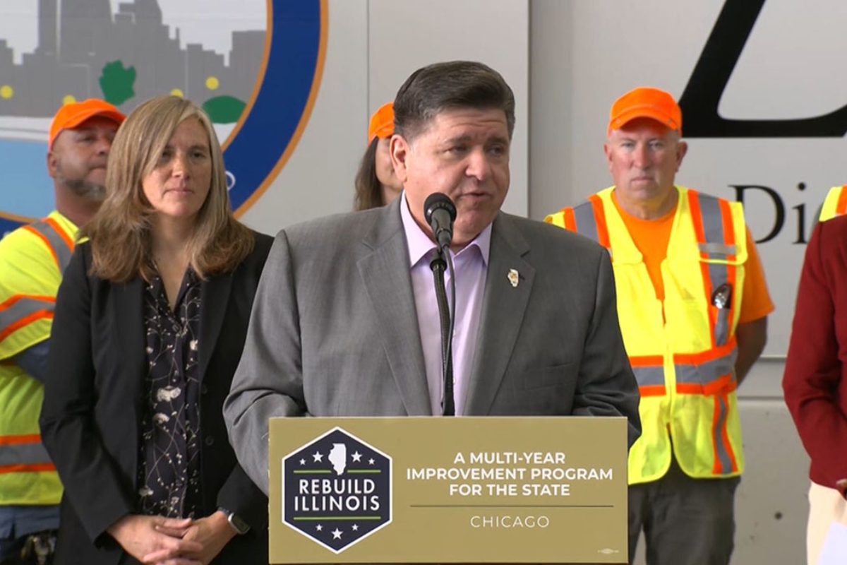 Gov. JB Pritzker announces the state’s six-year, $50.6 billion infrastructure plan at a news conference Wednesday in Chicago. (Illinois.gov screenshot)