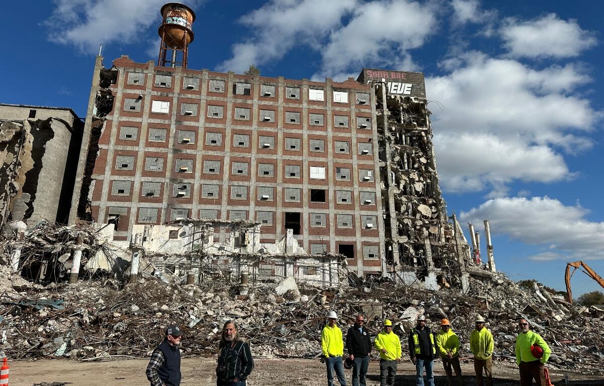 FILE-Demolition workers stand outside the former Pillsbury Plant in Springfield in Late-October, 2026.