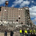FILE-Demolition workers stand outside the former Pillsbury Plant in Springfield in Late-October, 2026.