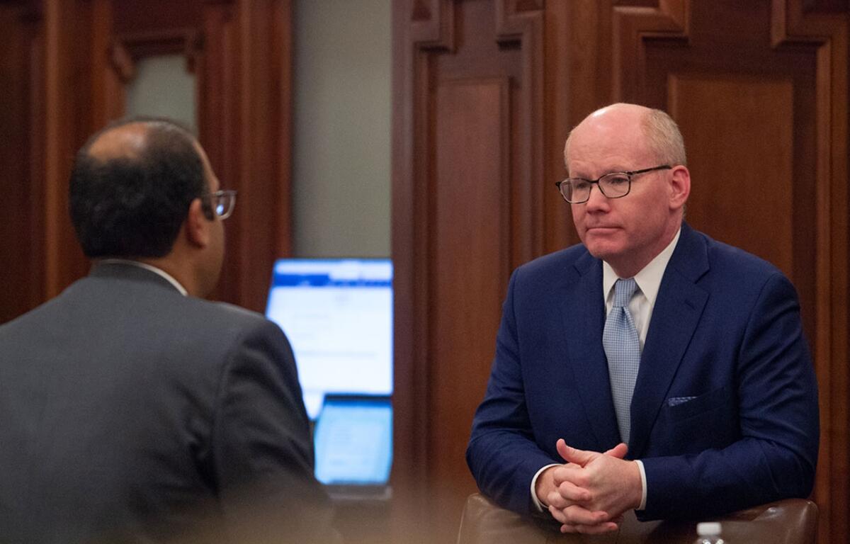 Senate President Don Harmon, D-Oak Park, confers with Sen. Ram Villivalam on the Senate floor on Oct. 30, 2025. (Capitol News Illinois photo by Jerry Nowicki)