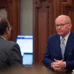 Senate President Don Harmon, D-Oak Park, confers with Sen. Ram Villivalam on the Senate floor on Oct. 30, 2025. (Capitol News Illinois photo by Jerry Nowicki)